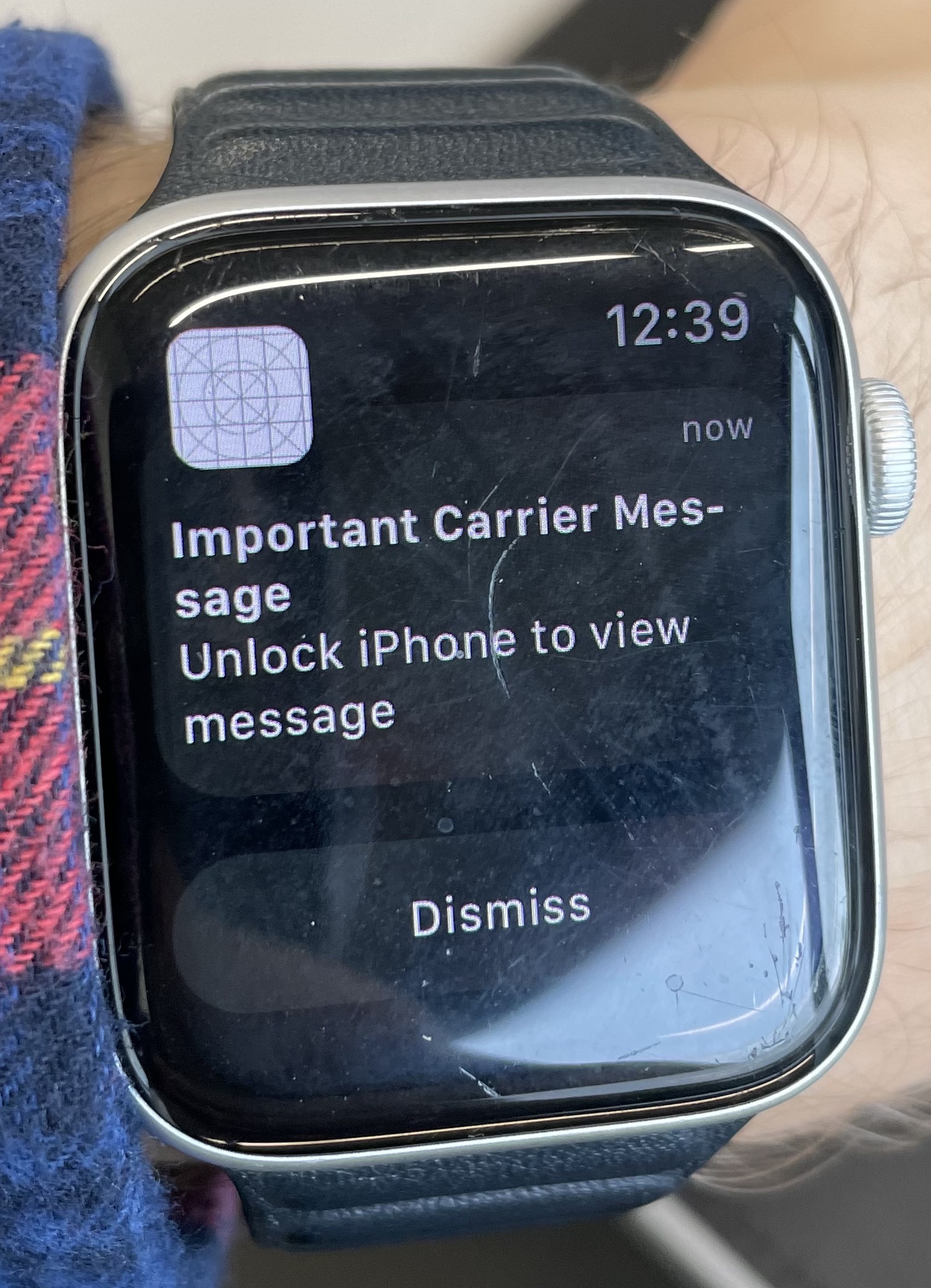 Apple Watch showing an important carrier message.